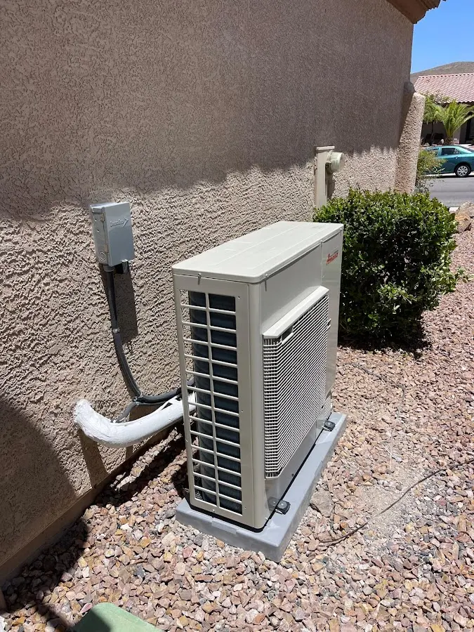 Residential air conditioning condenser unit in Acton